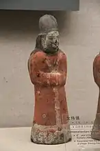 Example of a female attendant wearing an early Xianbei garb, the opening is zuoren, unearthed in Sima Jinlong tomb, Northern Wei, 484 AD.