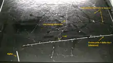 Image taken in the Pic du Midi at 2877&nbsp;m in a Phywe PJ45 cloud chamber (size of surface is 45 x 45 cm). This rare picture shows in a single shot the 4 particles that are detectable in a cloud chamber : proton, electron, muon (probably) and alpha