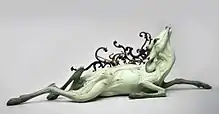 Title: "Obariyon" Year: 2013 Dimensions: H 17 x L 46 x D 30 in. Materials: Stoneware, antique hooks