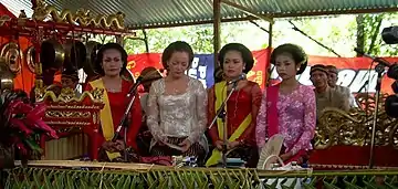 javanese poetry, Sindhens performance with Gamelan Ensemble on a ceremony in Java, Indonesia, on 5 November 2015