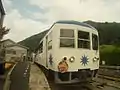 Okuizumo Orochi-gō 98 tourist train headed for Bingo Ochiai (2006-06-25)
