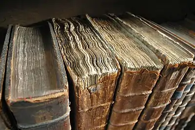 Old hardcover books at the Merton College library.