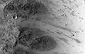 Oblong boulder on Mars – lands upright after rolling down a hill (MRO; July 3, 2014)(.mw-parser-output .geo-default,.mw-parser-output .geo-dms,.mw-parser-output .geo-dec{display:inline}.mw-parser-output .geo-nondefault,.mw-parser-output .geo-multi-punct{display:none}.mw-parser-output .longitude,.mw-parser-output .latitude{white-space:nowrap}31°S 302°E / 31°S 302°E / -31; 302).