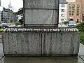 The part of the inscription on the pedestal