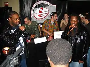 Attrell "Prince Be" Cordes (left) with his infamous cousin Doc. G (right) performing in 2006