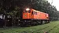 922 approaching Del Pilar Crossing as a solo locomotive on a rainy day. (Astro, 2022)