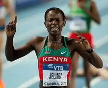 Pamela Jelimo celebrating her win after finishing the 800 metres.