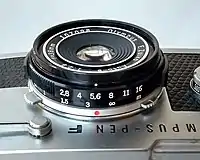 Olympus Pen F/FT (35mm analog film) lens E. Zuiko Auto-S 1:2,8 f = 38 mm 1966