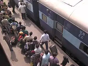 People boarding a train