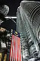 Looking up from the base at night with a large Malaysian flag