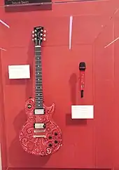 Taylor Swift’s "Les Paul" guitar and cordless microphone