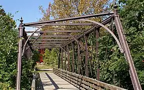 Bridge on the Works site, crossing French Creek (once carrying a spur from the Pickering Valley Railroad), constructed with Phoenix columns..mw-parser-output .geo-default,.mw-parser-output .geo-dms,.mw-parser-output .geo-dec{display:inline}.mw-parser-output .geo-nondefault,.mw-parser-output .geo-multi-punct{display:none}.mw-parser-output .longitude,.mw-parser-output .latitude{white-space:nowrap}40°08′08.4″N 75°31′03″W﻿ / ﻿40.135667°N 75.51750°W﻿ / 40.135667; -75.51750﻿ (Phoenix Column Truss Bridge)