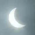 Partial viewed from Biak, Papua, 05:25 UTC - post-totality