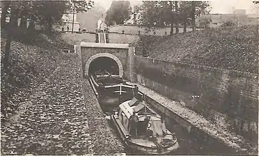 Trolley boat at the canal tunnel of Pouilly-en-Auxois