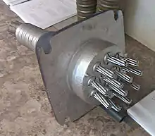a detached anchor displaying tendon lock-offs