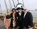 Governor Larry Hogan (right) and former Baltimore mayor Catherine Pugh (2nd from left) wearing state flag apparel
