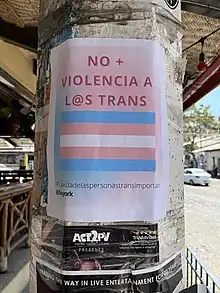 Photograph of a sign on a pole