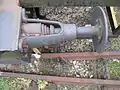 Volute spring within buffer assembly on coach
