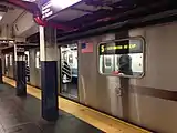 An R142 5 train at the southbound platform, bound for Bowling Green