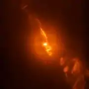 R Aquarii peculiar stellar relationship captured by SPHERE.