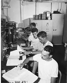 Photo of Glendenin on board the USS&nbsp;Chilton