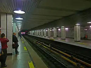 Two contact rails at the Rechnoy Vokzal station of the Novosibirsk Metro a station with left-hand platforms.