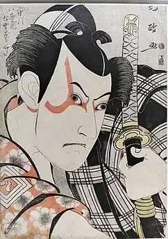 The mon on the right sleeve of the kimono of Kabuki actor Ichikawa Yaizo III, dressed as Umeōmaru. The kanji 八, meaning 'eight', is written within the triple square. Ukiyo-e (woodblock print) by Utagawa Kunimasa, 1796.