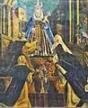 This painting depicts the Virgin giving the rosary to St. Dominic; in the scene also appear Fray Pedro de Santa María Ulloa, Saint Catherine of Siena and Servant of God, Mary of Jesus de León y Delgado. The fresco is located in the Church of Santo Domingo in San Cristóbal de La Laguna, Tenerife, Spain.