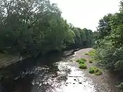River Wharfe from Linton Bridge.mw-parser-output .geo-default,.mw-parser-output .geo-dms,.mw-parser-output .geo-dec{display:inline}.mw-parser-output .geo-nondefault,.mw-parser-output .geo-multi-punct{display:none}.mw-parser-output .longitude,.mw-parser-output .latitude{white-space:nowrap}53°54′47.53″N 1°24′38.92″W﻿ / ﻿53.9132028°N 1.4108111°W﻿ / 53.9132028; -1.4108111