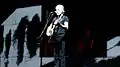 Playing an acoustic guitar during "Mother"