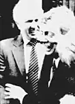 Black and white photograph of Ronald Ebens and Frank Eaman laughing