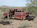 The remains of a car at the BS&K Mine. Notice the suicide doors.