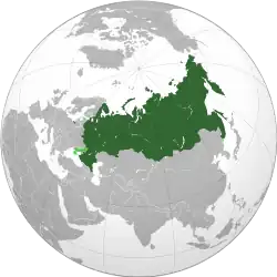 Russia on the globe, with claimed territories shown in light green
