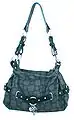 Hobo bag with top zipper, shoulder strap, and characteristic slouch in the middle