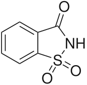 Saccharin, a cyclic sulfonamide that was one of the first artificial sweeteners discovered.
