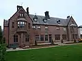 Saint Joseph's Home, Woolton Road, Childwall, Garden front showing 1866 alterations by Augustus by Edward Welby Pugin(1845–47 & 1866; Grade II*)