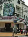 The road sign in front of Sala Chalermkrung Royal Theatre
