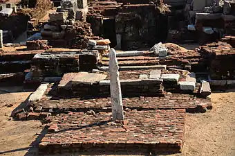 Stone vel on a brick platform at the entrance to the Murugan Temple, Saluvankuppam, 300 BC