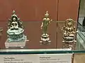 Seated Buddha, Padmapani and female bodhisattva