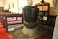Font, carved from one piece of wood