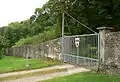 Wall of the Saupark Springe with gate