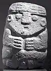 Seated figure; 2nd century BCE-3rd century CE; stone; 63.5 × 44.45 × 20.32&nbsp;cm (25 × 17.mw-parser-output .frac{white-space:nowrap}.mw-parser-output .frac .num,.mw-parser-output .frac .den{font-size:80%;line-height:0;vertical-align:super}.mw-parser-output .frac .den{vertical-align:sub}.mw-parser-output .sr-only{border:0;clip:rect(0,0,0,0);clip-path:polygon(0px 0px,0px 0px,0px 0px);height:1px;margin:-1px;overflow:hidden;padding:0;position:absolute;width:1px}1⁄2 × 8 in.); weight: 102.5129&nbsp;kg (226&nbsp;lb.); Metropolitan Museum of Art (New York City)
