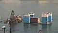 Semi-submersible ship used to install large precast unit.
