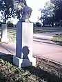 Shadow of Jarman on G. Chappell's pedestal