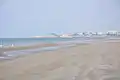 Qurum Beach - Crowne Plaza Muscat can be seen in the distance (on the cliff-top)