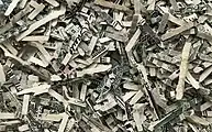 Shreds of unfit US dollar notes with a typical size of less than 1.5 mm x 16 mm