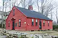 Lt. Simeon Wheelock House (1768), Deborah Wheelock Chapter, D.A.R. Lt. Wheelock, who was born in 1741, died in Shays' Rebellion in 1786, while on duty protecting the Springfield Armory. Shays' Rebellion had opening salvos in Uxbridge.