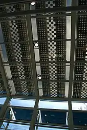 Overhead metallic panels