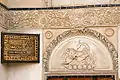 Stone relief above the entrance door