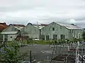 Derelict iron sheds, now demolished